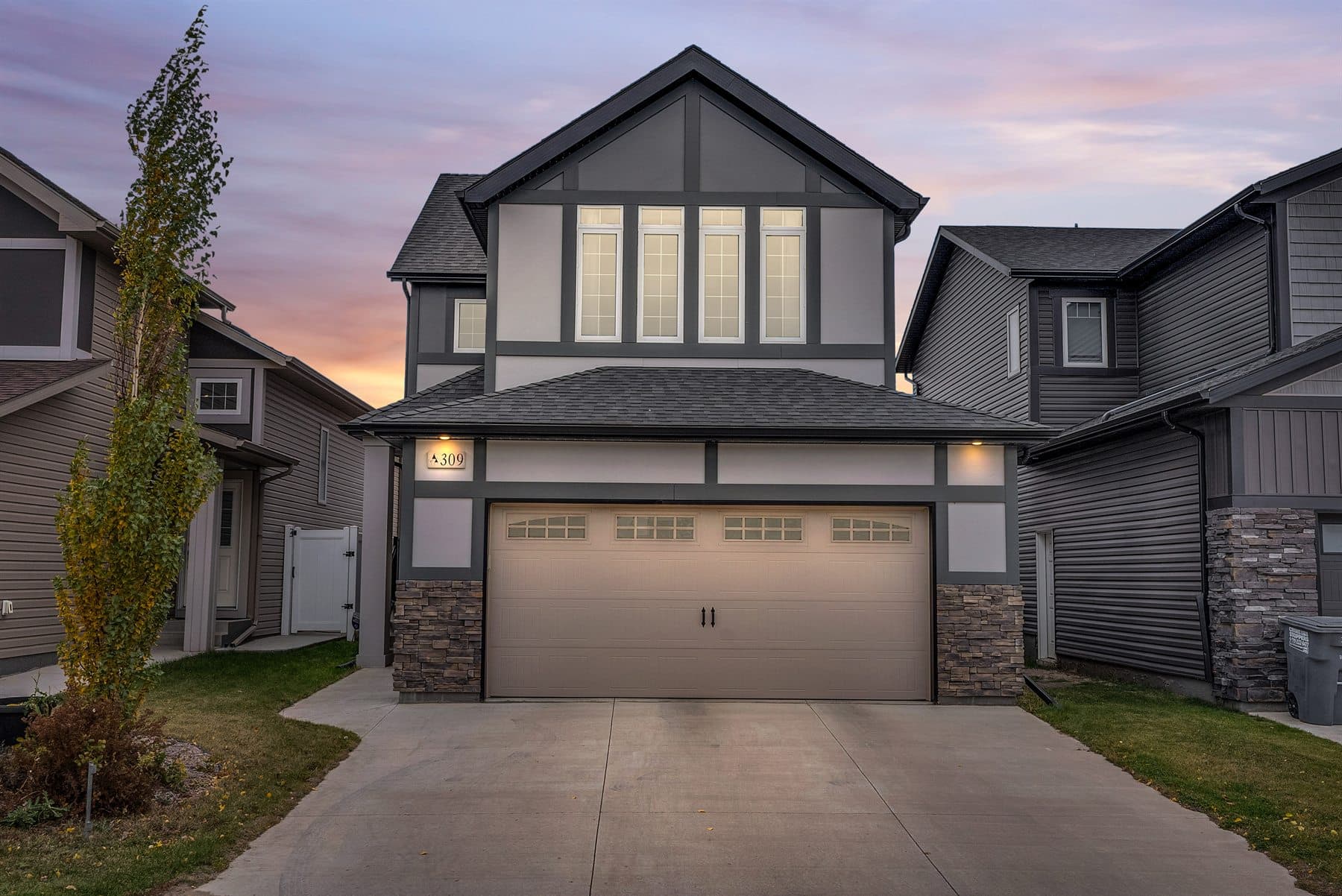 Saskatoon twilight listing exterior photography with dramatic evening sky